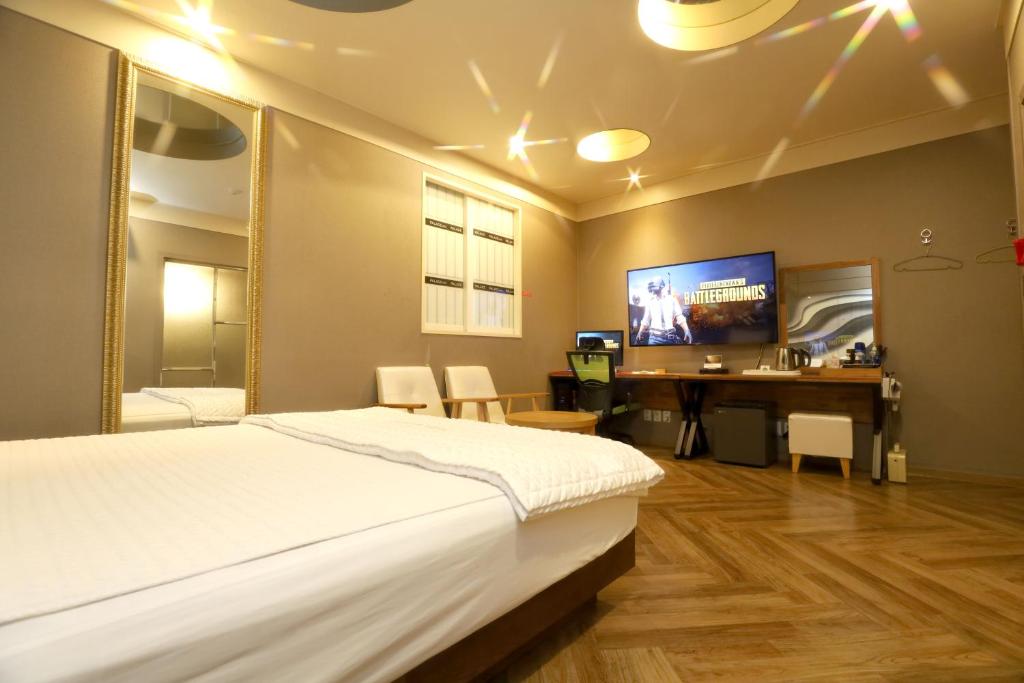 Postel nebo postele na pokoji v ubytování Palace Hotel