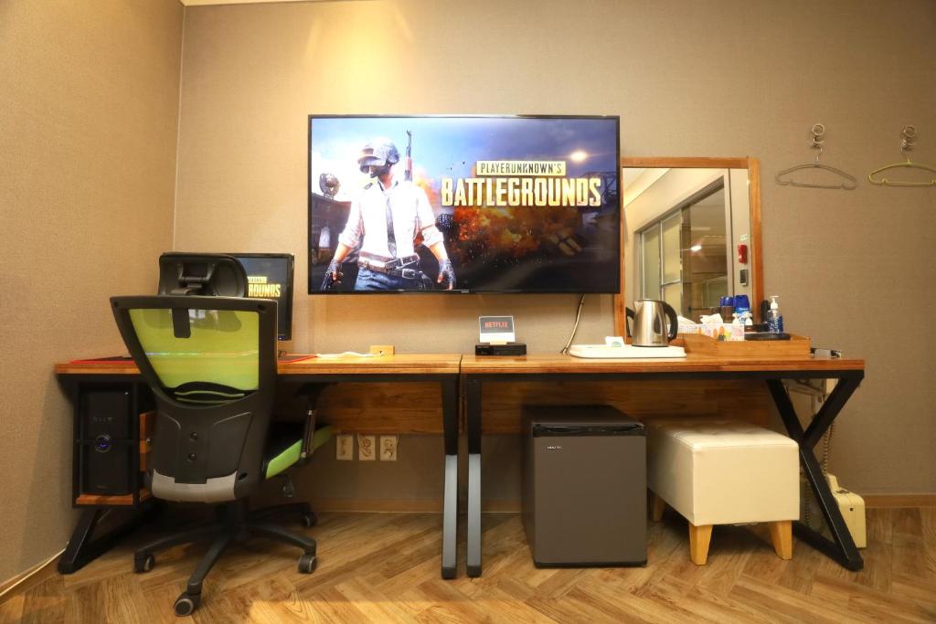 TV a/nebo společenská místnost v ubytování Palace Hotel