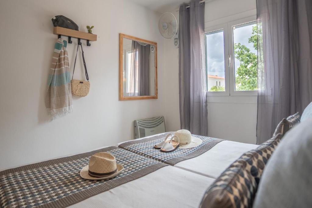 Postel nebo postele na pokoji v ubytování Apartamentos Royal Life