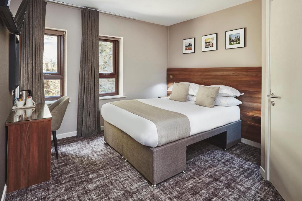 Voodi või voodid majutusasutuse The Ranald Hotel toas
