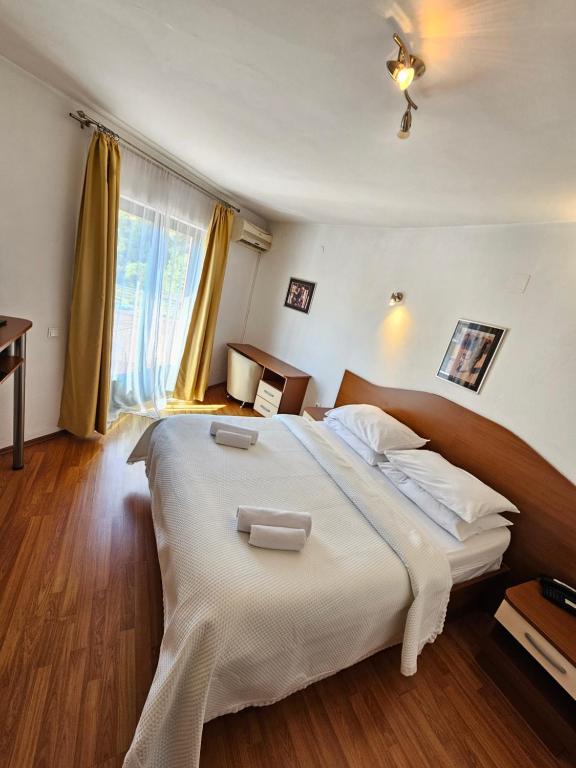 Voodi või voodid majutusasutuse Hotel Prvan toas