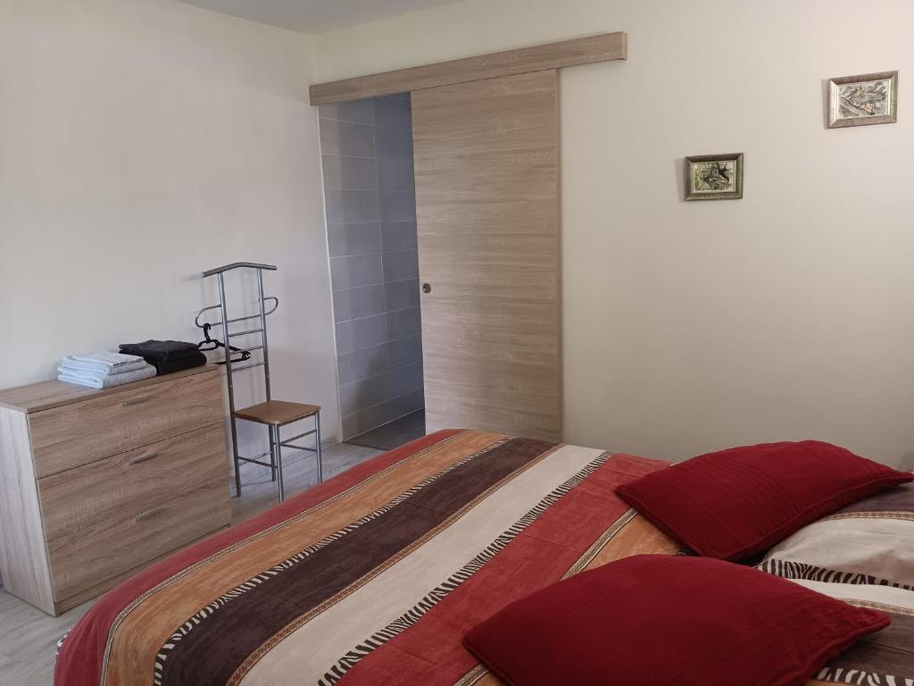 Postel nebo postele na pokoji v ubytování Le Moulin du Comte