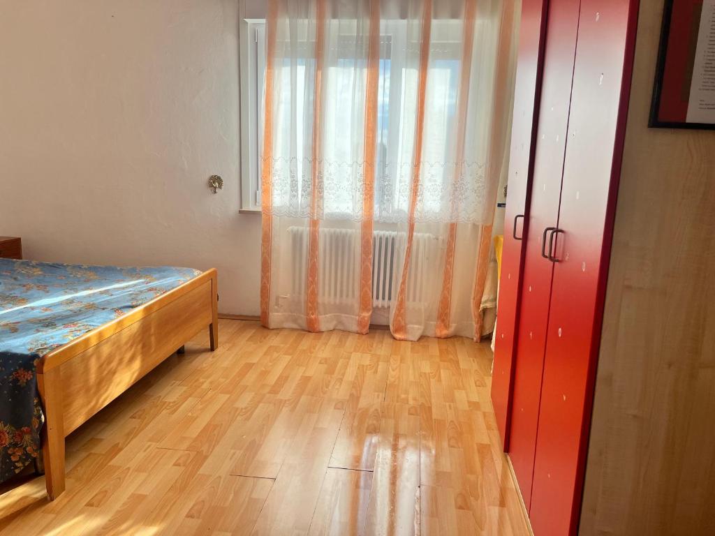 Postel nebo postele na pokoji v ubytování Stanze private in appartamento