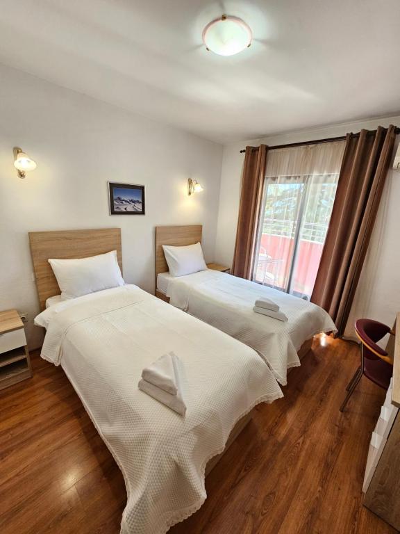 Voodi või voodid majutusasutuse Hotel Prvan toas