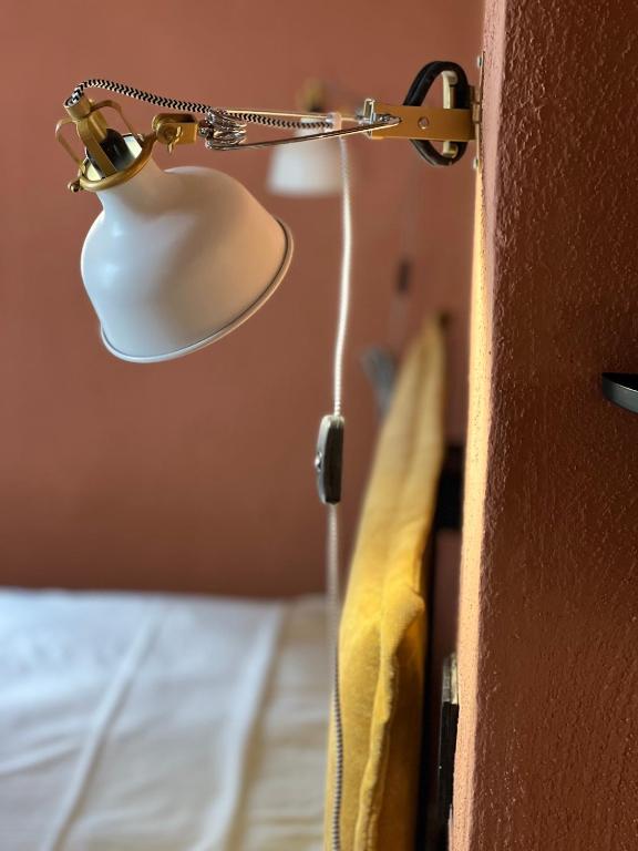 Postel nebo postele na pokoji v ubytování GarganoMareBorghi ospitalità diffusa