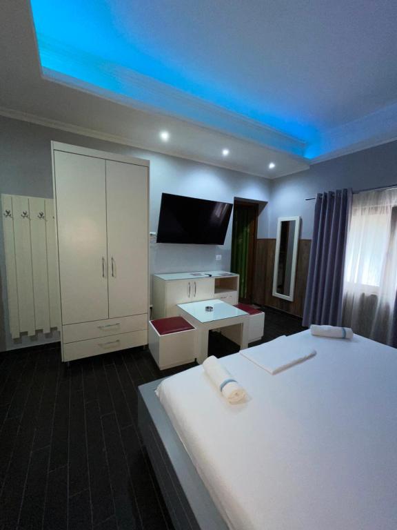 Postel nebo postele na pokoji v ubytování Imperium Hotel