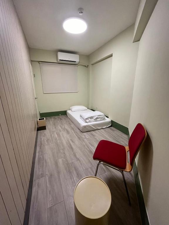 Postel nebo postele na pokoji v ubytování Nobiggie lnn
