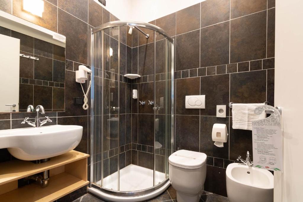 Koupelna v ubytování Jonico Hotel