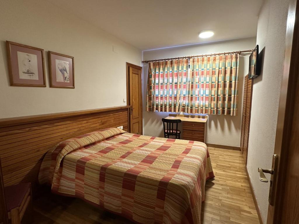 Postel nebo postele na pokoji v ubytování Hosteria Gelin de Gajano
