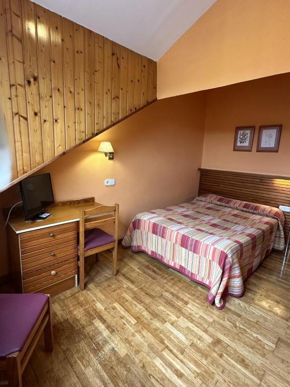 Postel nebo postele na pokoji v ubytování Hosteria Gelin de Gajano