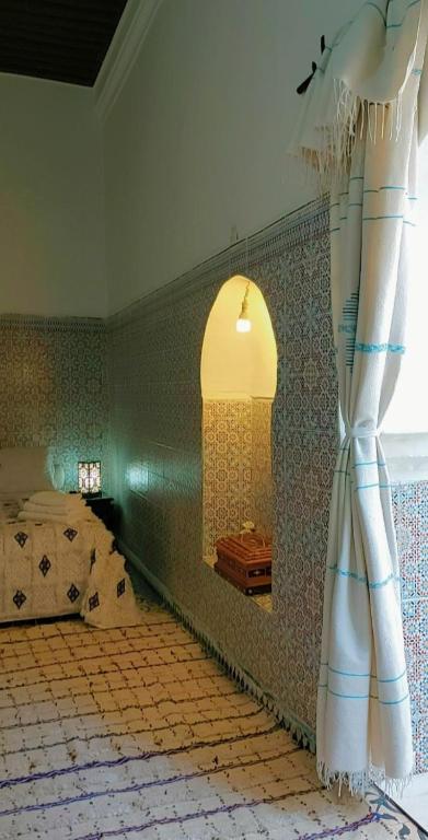 Postel nebo postele na pokoji v ubytování Riad Diafa