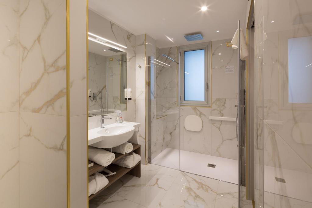 Koupelna v ubytování Hotel Nasco