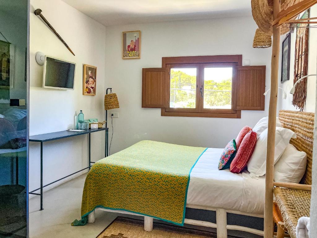 Postel nebo postele na pokoji v ubytování Hostal Mar y Sal