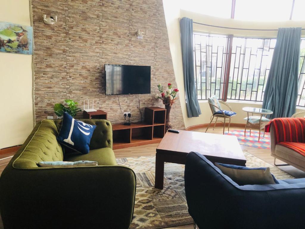 TV a/nebo společenská místnost v ubytování Pendeza La Casa