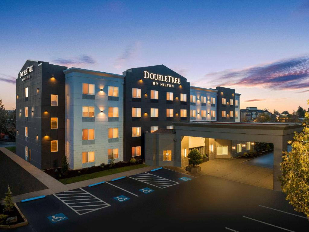 a rendering of the dunder mifflin hotel at dusk at DoubleTree by Hilton North Salem in Salem