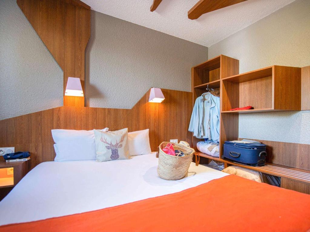 Postel nebo postele na pokoji v ubytování ibis Styles Gien