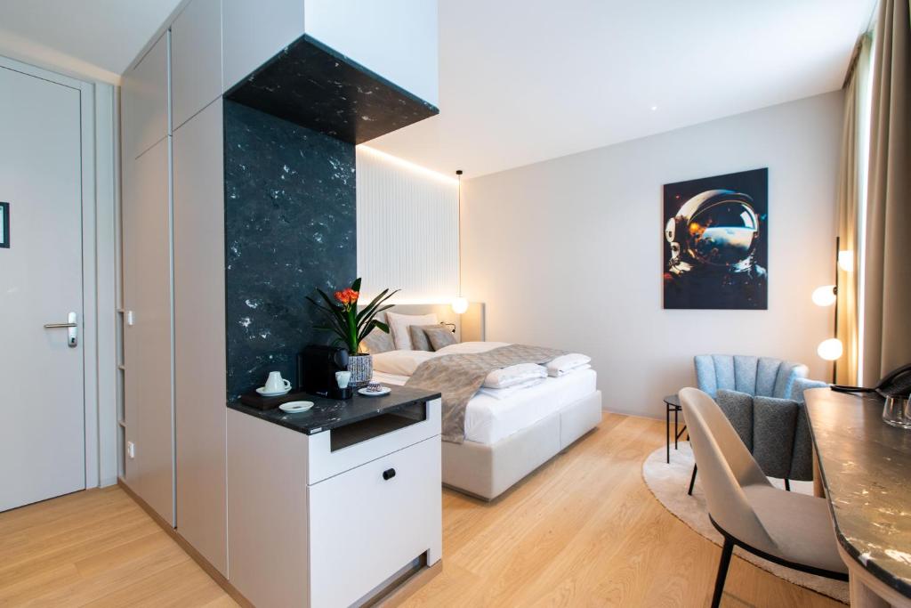 Posezení v ubytování Apollo AchtQuartier Das Hotel am Mondsee