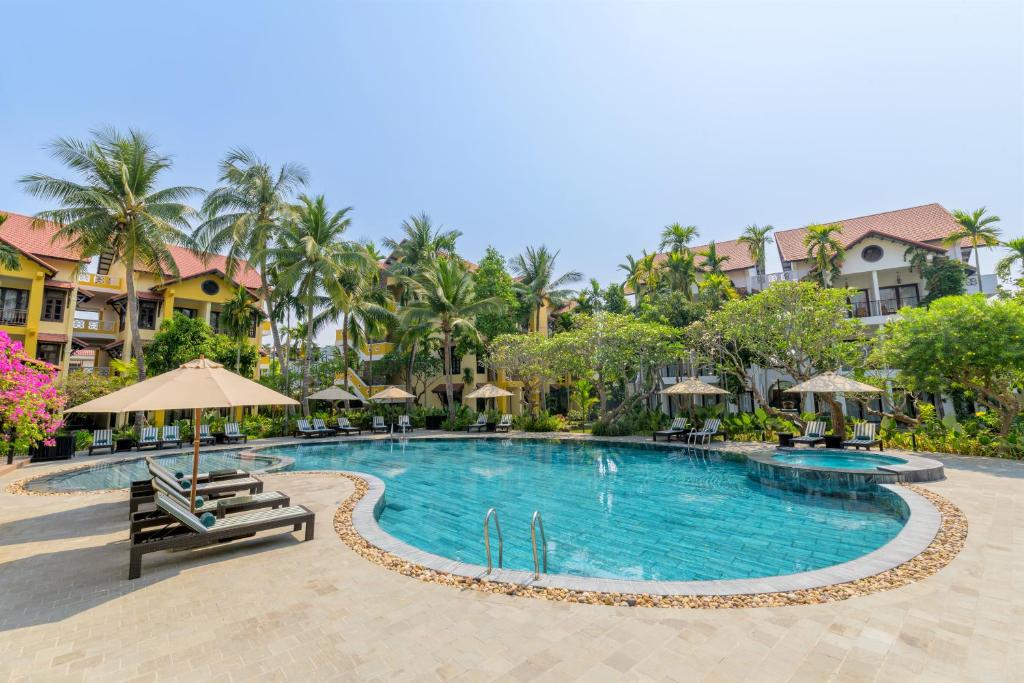 een afbeelding van een zwembad in een resort bij Anmira Resort & Spa Hoi An by The Unlimited Collection in Hội An