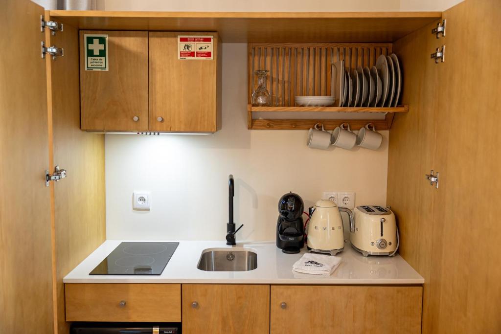 A cozinha ou kitchenette de Peso Village