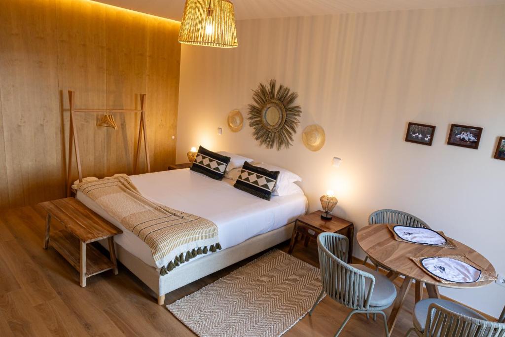 Uma cama ou camas num quarto em Peso Village
