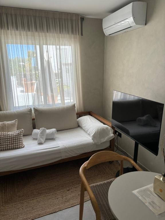 Postel nebo postele na pokoji v ubytování Boho Suites Formentera