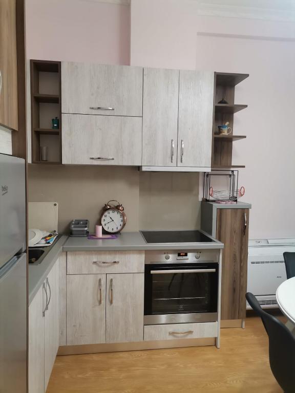 Kuchyň nebo kuchyňský kout v ubytování Cosy home Lalëz Durrës