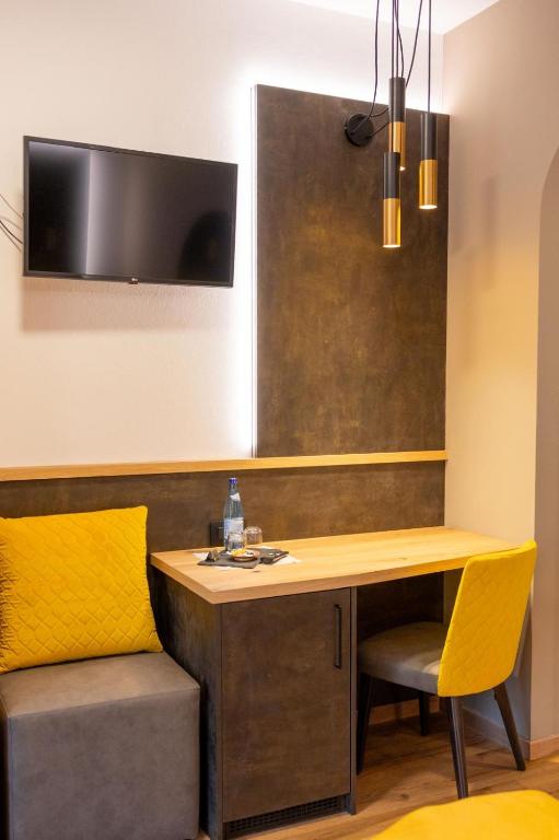 TV a/nebo společenská místnost v ubytování Hotel Garni Christin