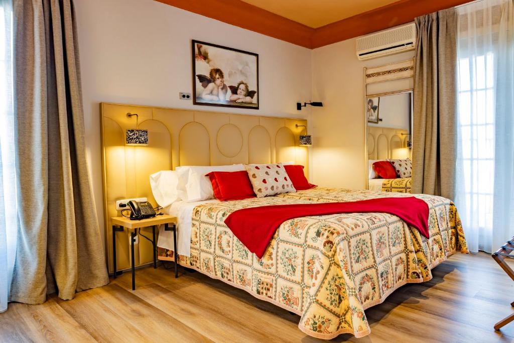 Postel nebo postele na pokoji v ubytování Hotel Cortijo Landete