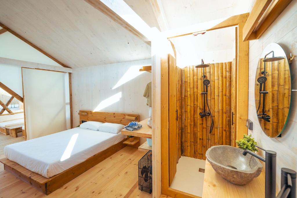 Postel nebo postele na pokoji v ubytování Kampaoh Kikopark Playa