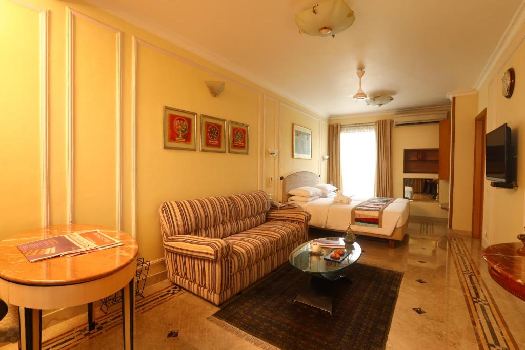 TV a/nebo společenská místnost v ubytování Regency Hotel Malabar Hill
