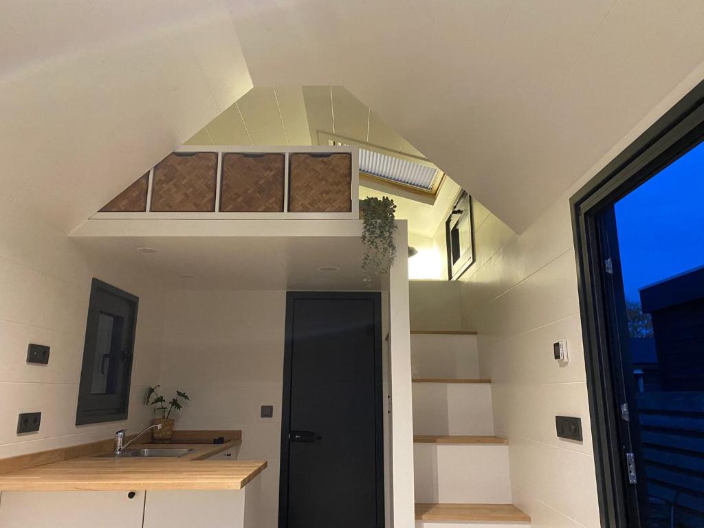 Kuchyň nebo kuchyňský kout v ubytování Tiny house with sauna & jacuzzi near Amsterdam