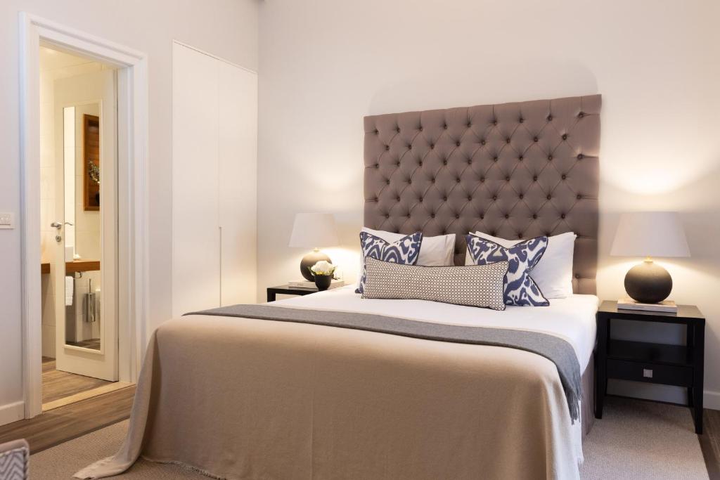 Postel nebo postele na pokoji v ubytování Boutique Hotel Stari Grad