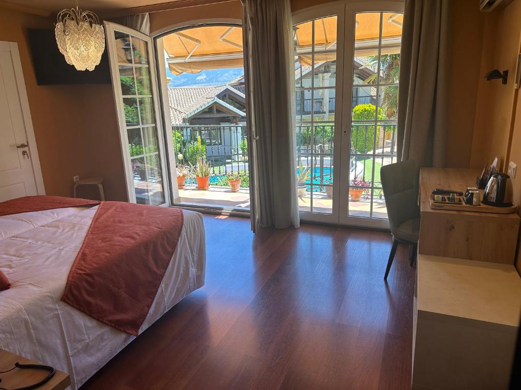 Postel nebo postele na pokoji v ubytování Hotel Cortijo Landete