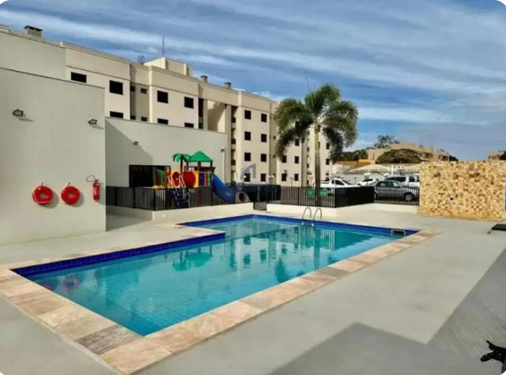 Der Swimmingpool an oder in der Nähe von Ap Proximo Unigran Escola Nota 10 Area central!