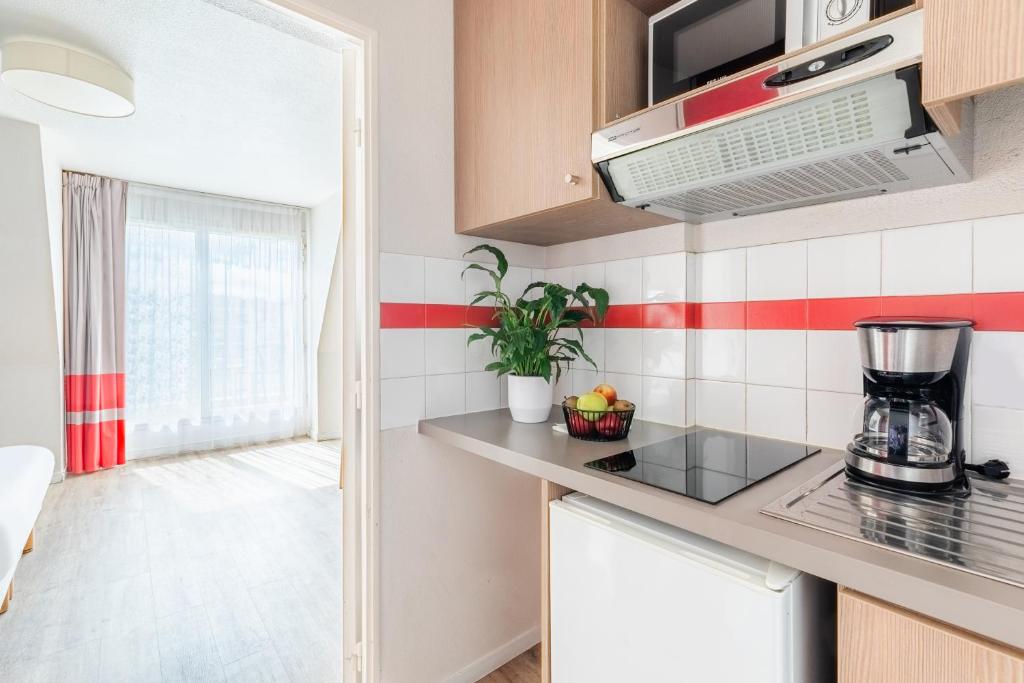 Appart'City Classic Paris La Villette - Resim 12