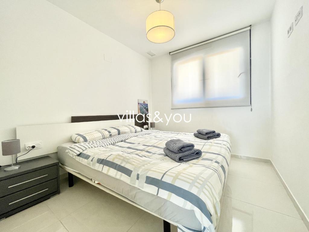 Postel nebo postele na pokoji v ubytování Sea Senses Punta Prima by Villas&You