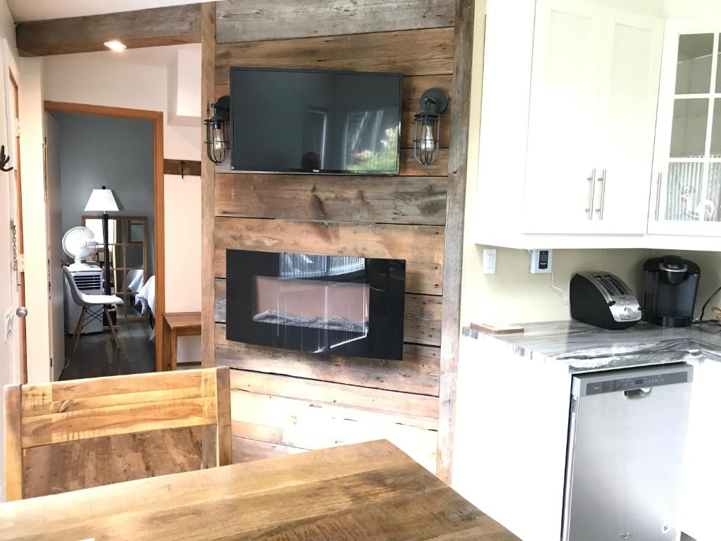 Kuchyň nebo kuchyňský kout v ubytování Au Pied de la Montagne CITQ29570Quatre