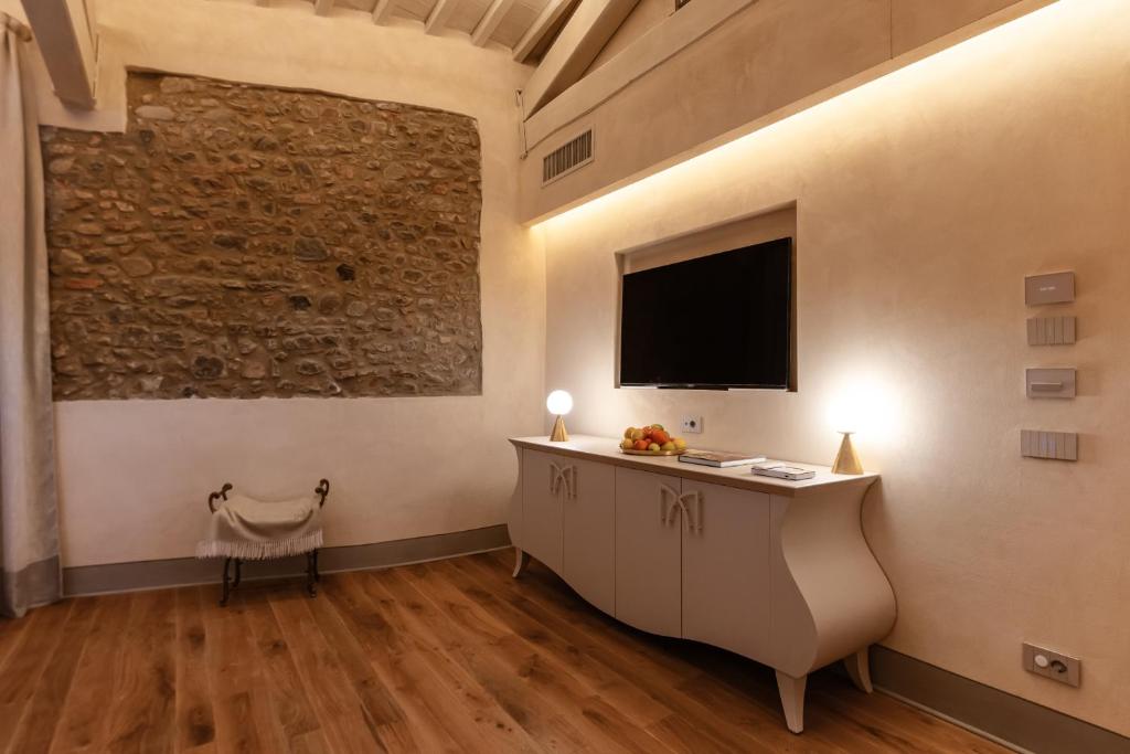 TV a/nebo společenská místnost v ubytování La Monastica Resort & Spa