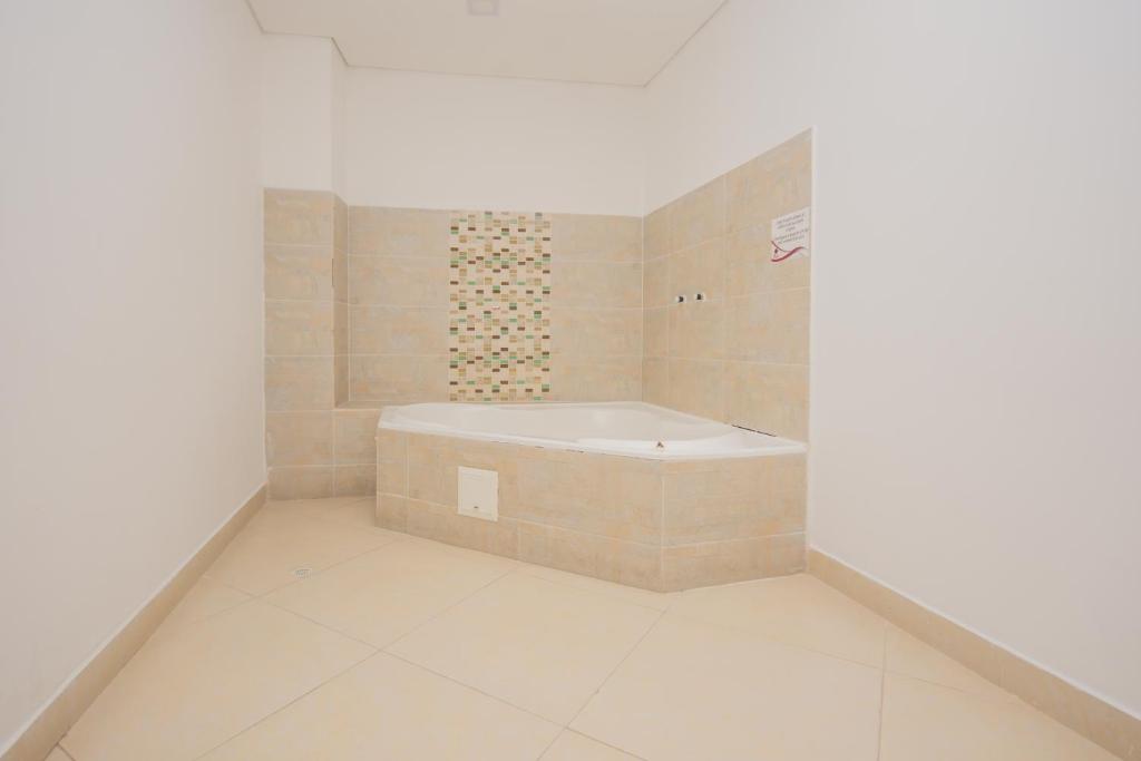 Koupelna v ubytování Hotel Perlatto