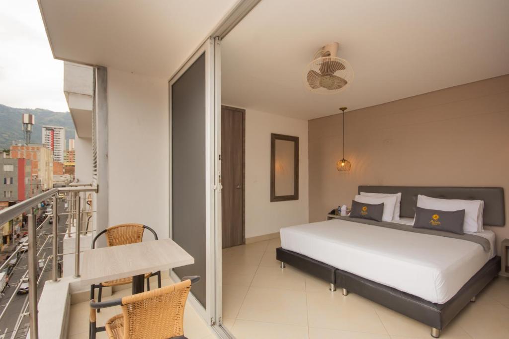 Postel nebo postele na pokoji v ubytování Hotel Perlatto