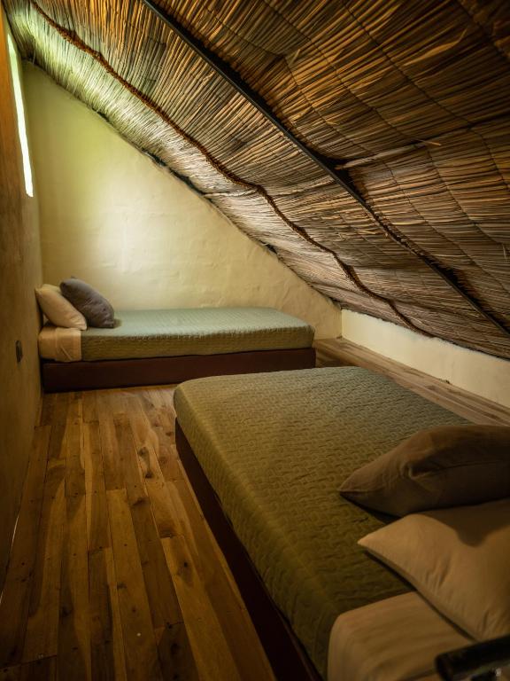 Postel nebo postele na pokoji v ubytování Jungla EcoLuxury Resort