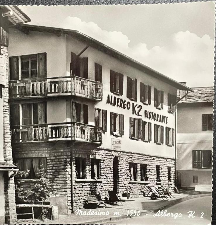 an old black and white photo of a building at Albergo K2 in Madesimo