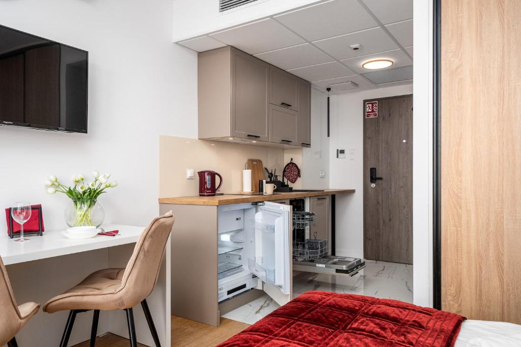 Kuchyň nebo kuchyňský kout v ubytování Pileckiego Residence