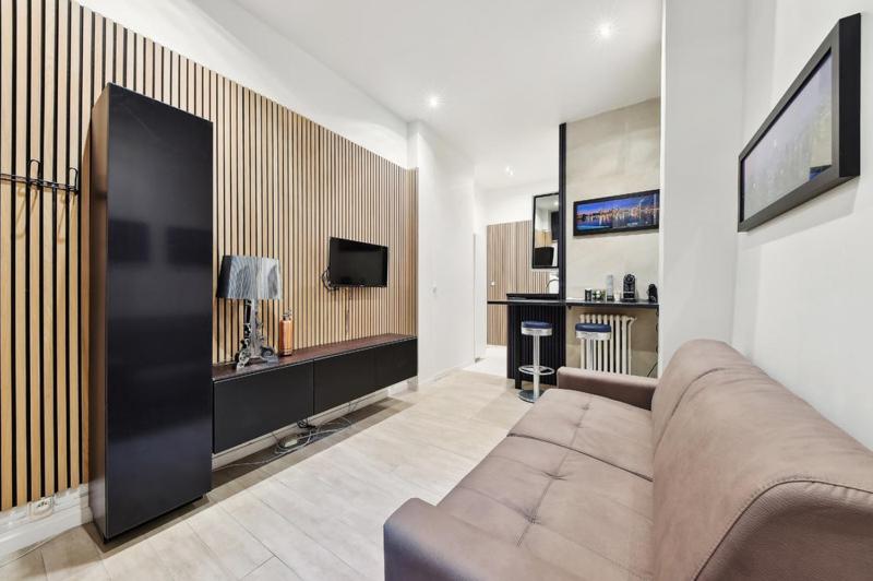 Televízia a/alebo spoločenská miestnosť v ubytovaní 269 Suite Pereire - Superb apartment in Paris