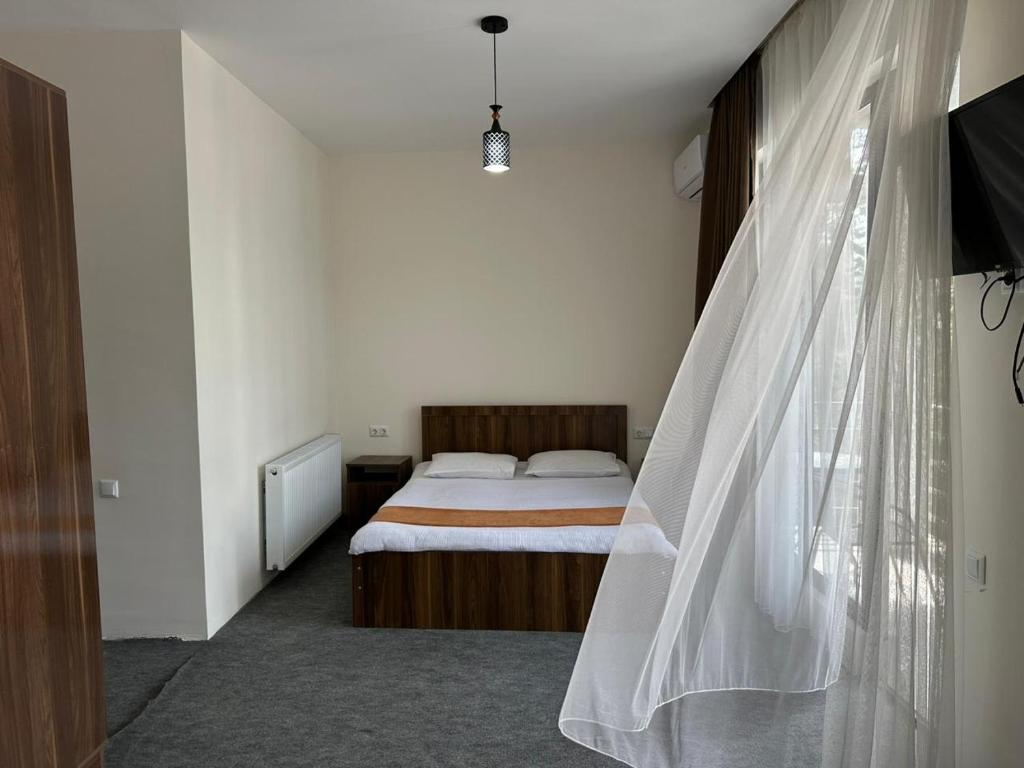 Postel nebo postele na pokoji v ubytování Guest House Nikola