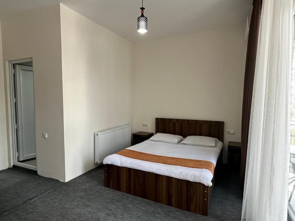 Postel nebo postele na pokoji v ubytování Guest House Nikola