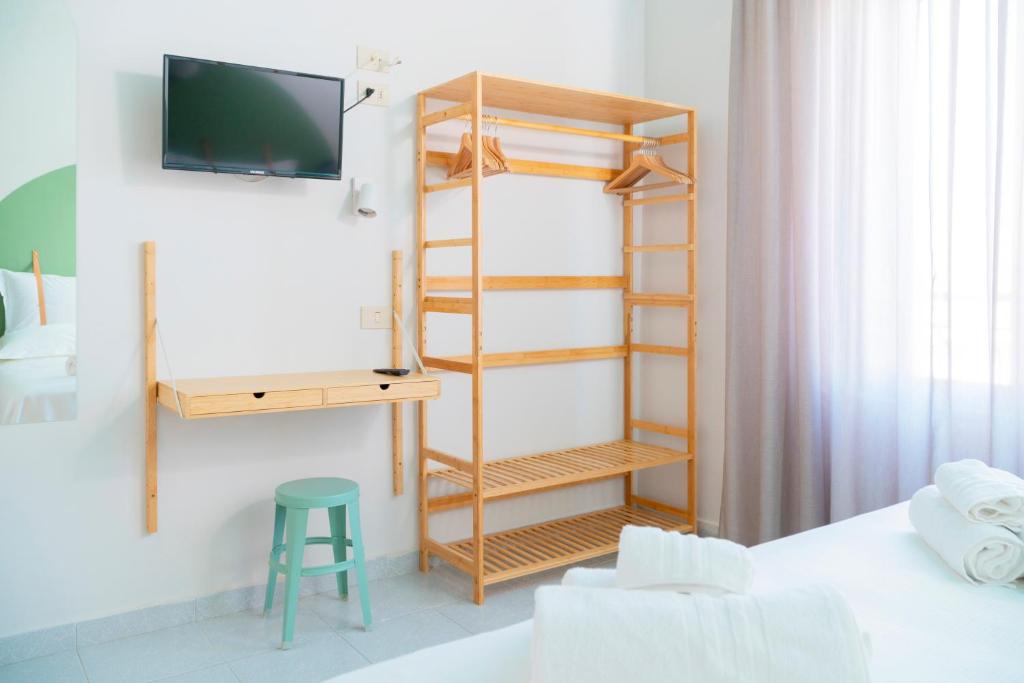 Postel nebo postele na pokoji v ubytování Hotel Belvedere Rimini