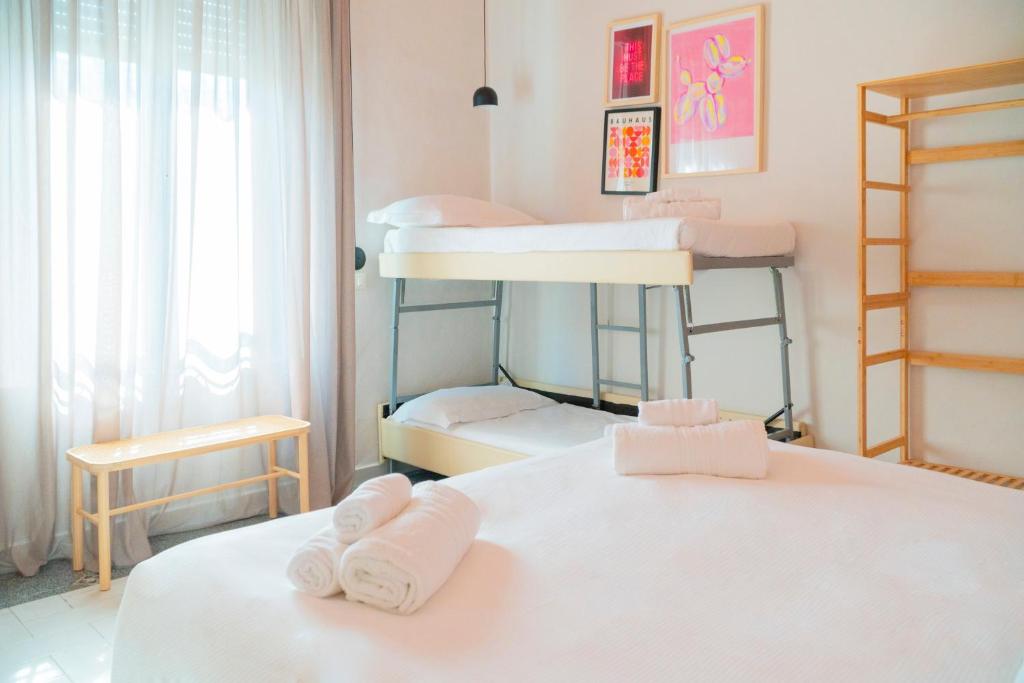 Postel nebo postele na pokoji v ubytování Hotel Belvedere Rimini