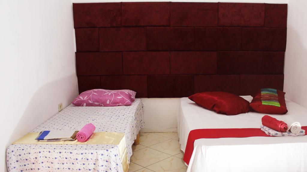 Postel nebo postele na pokoji v ubytování Hotel Erisun