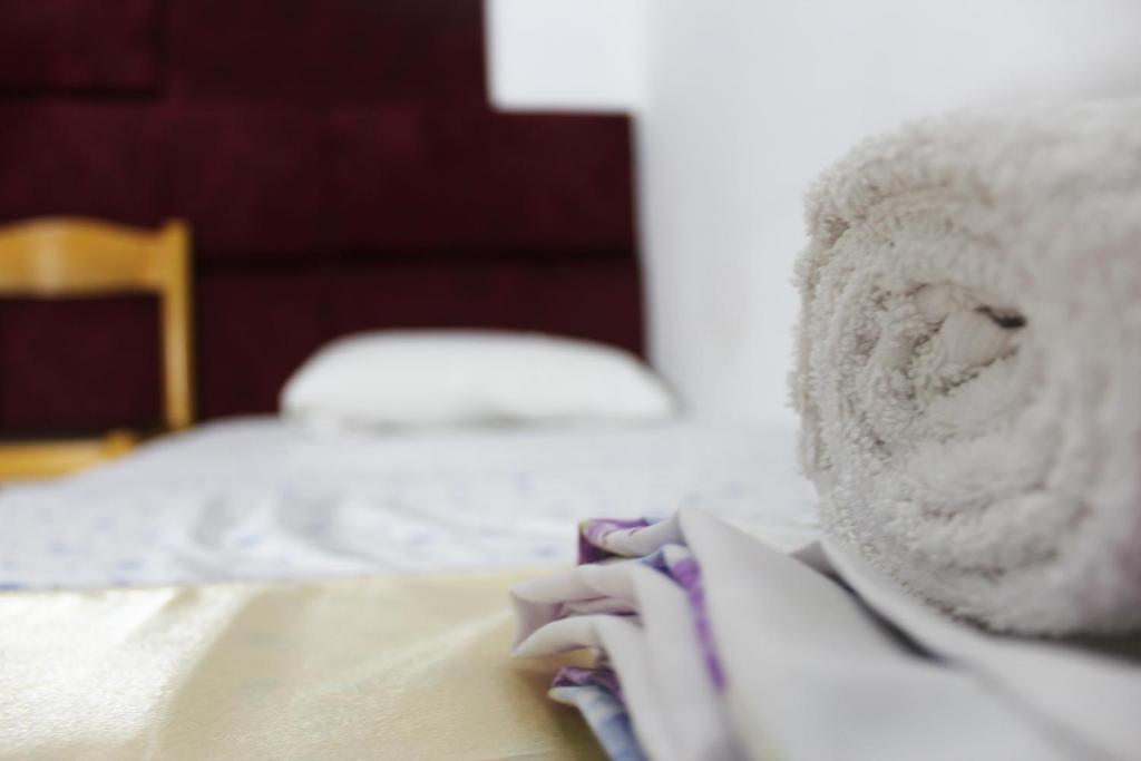 Postel nebo postele na pokoji v ubytování Hotel Erisun